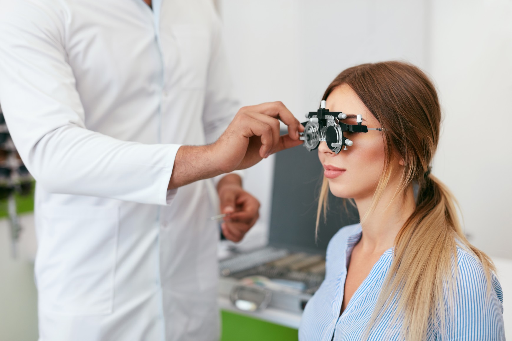 Doctor Inspecting Eye Of A Patient